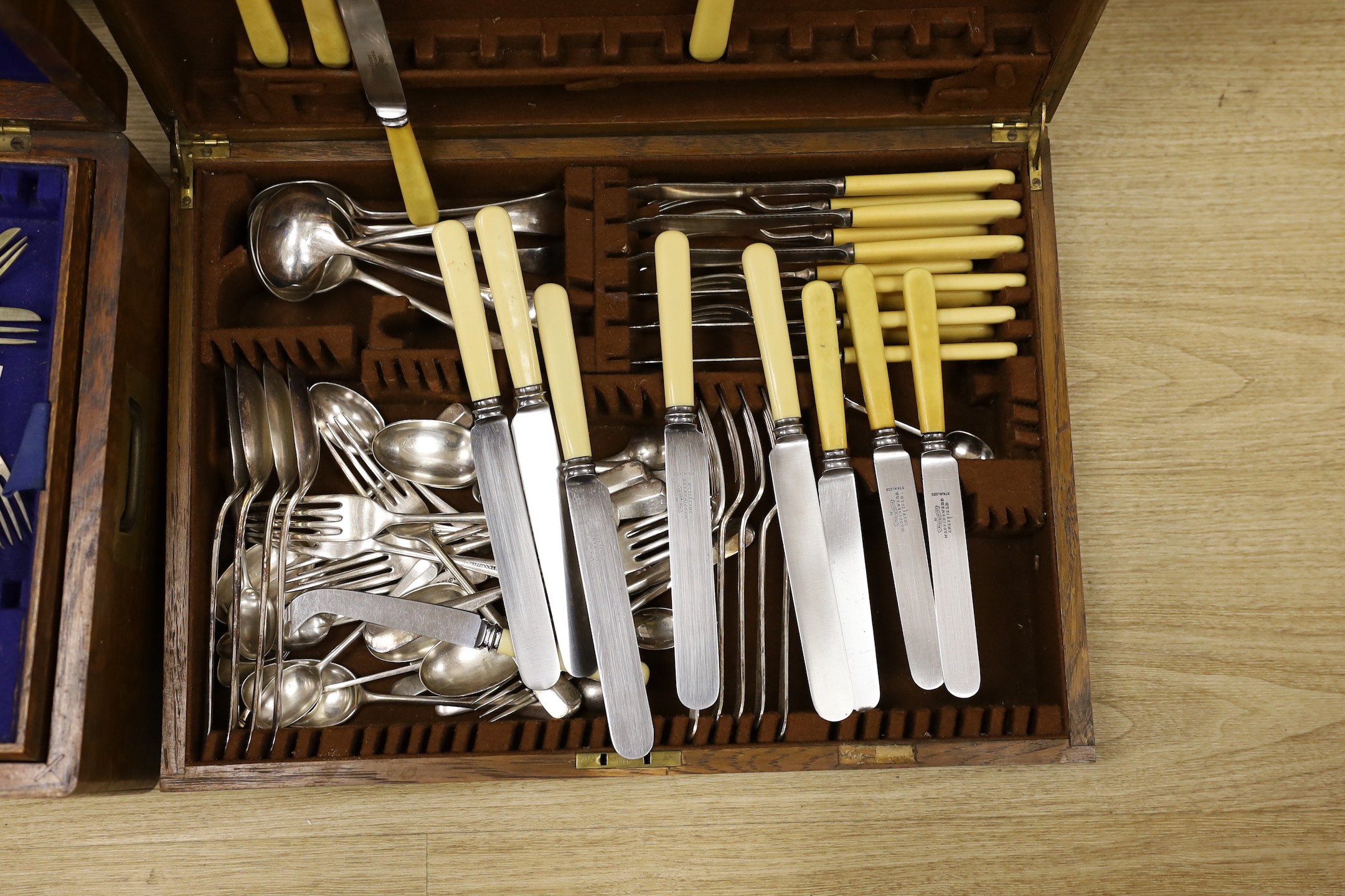 Two Mappin and Webb oak cased part cased plated canteens of cutlery